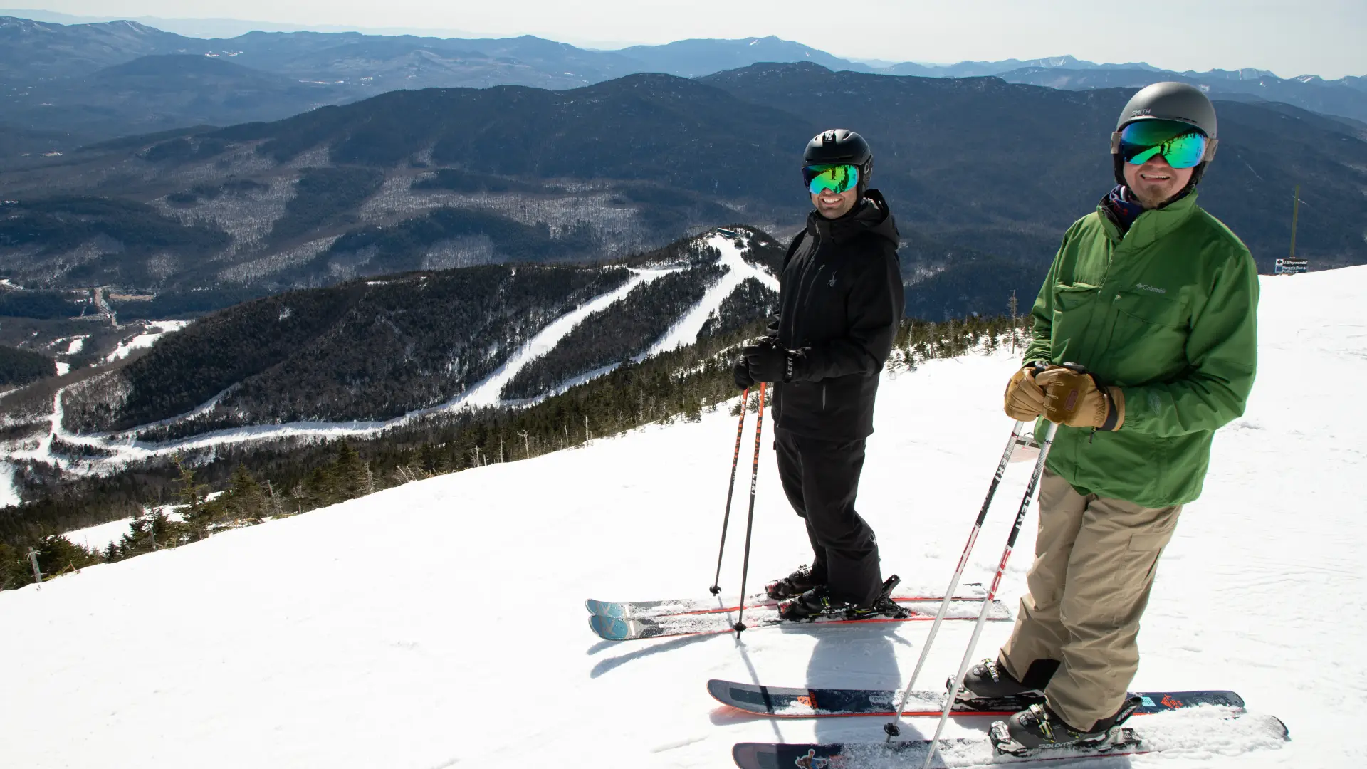 Two skiers await their run from the top of Whiteface Mountain.