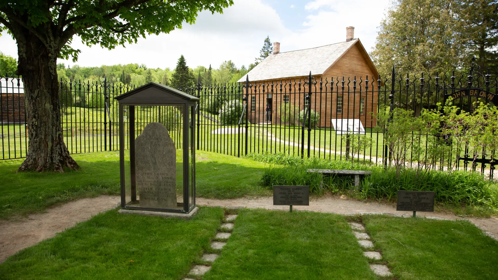 John Brown Farm gravesite and barn in summer