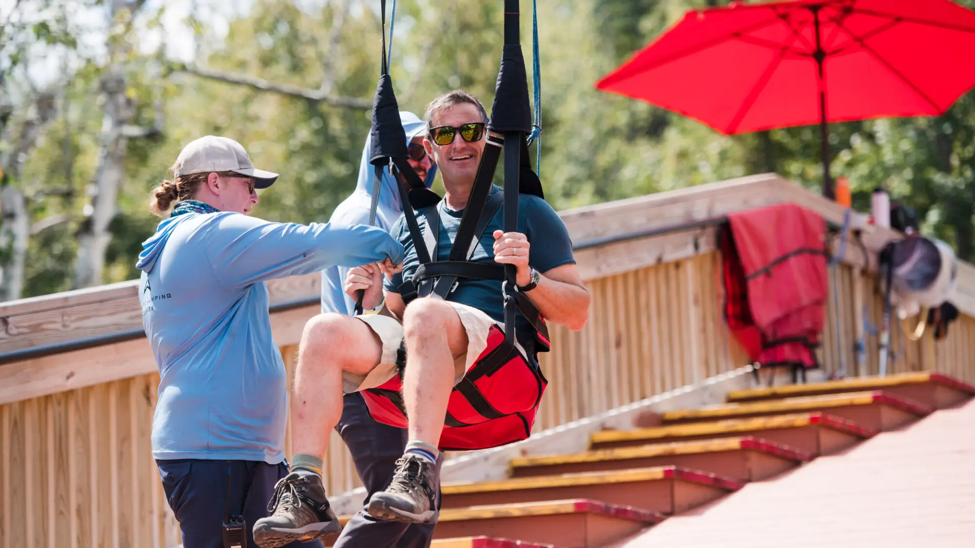 A person getting geared up to zipline.