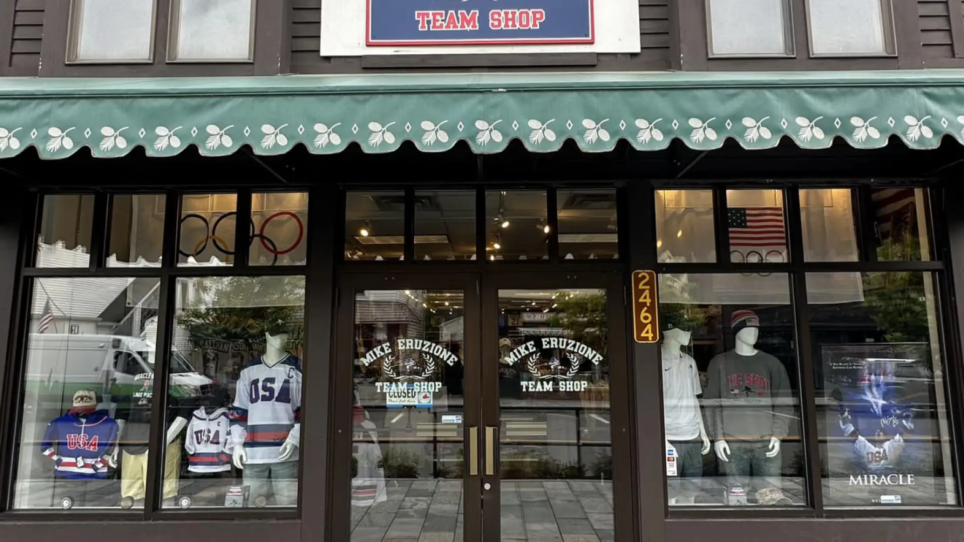 The storefront display of Mike Eruzione Team Shop on Main Street, Lake Placid