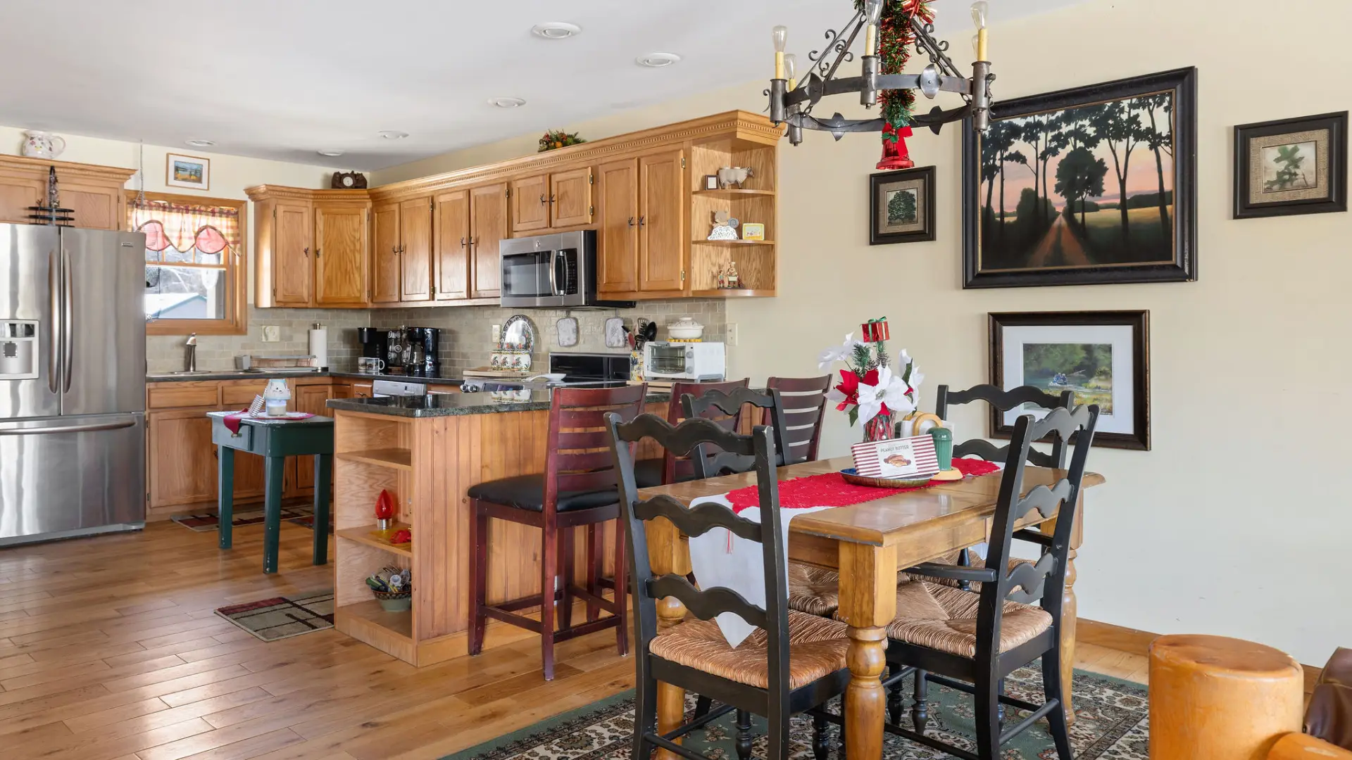 The spacious kitchen and dining nook at Lake Placid Pinehill Townhouse.