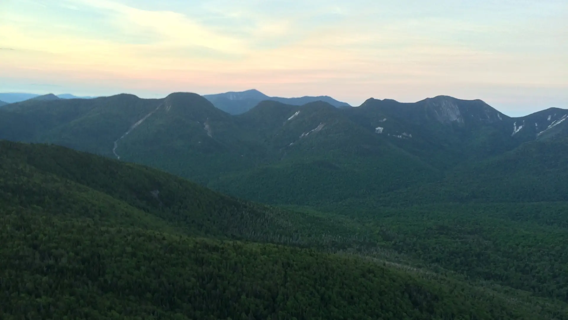 View of Adirondack Great Range at sunset in summer