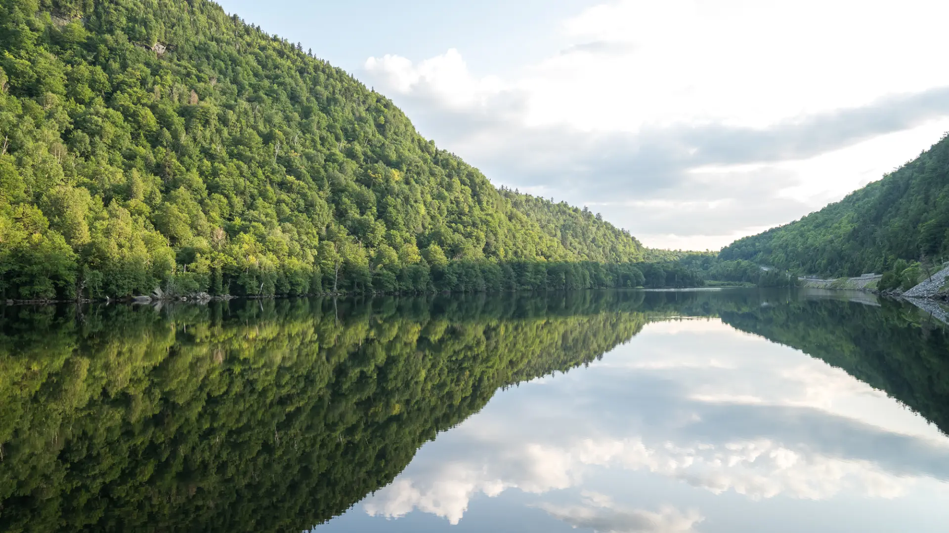 The peaceful reflective waters of the Cascade Lakes.