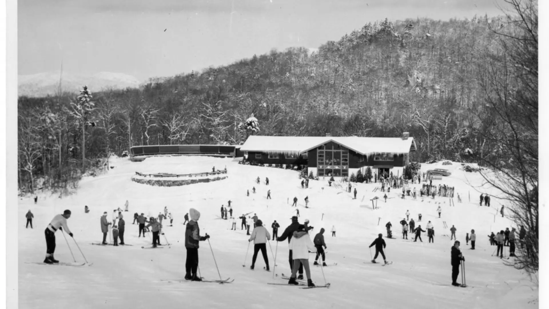 Skiers and the Mt. Whitney Lodge. Early 1960s