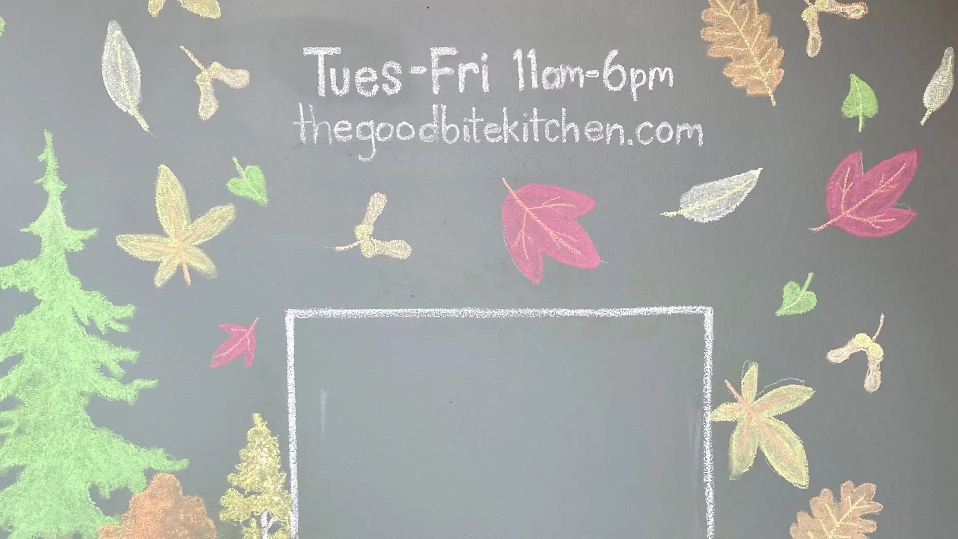 chalkboard leaf art with restaurant sign