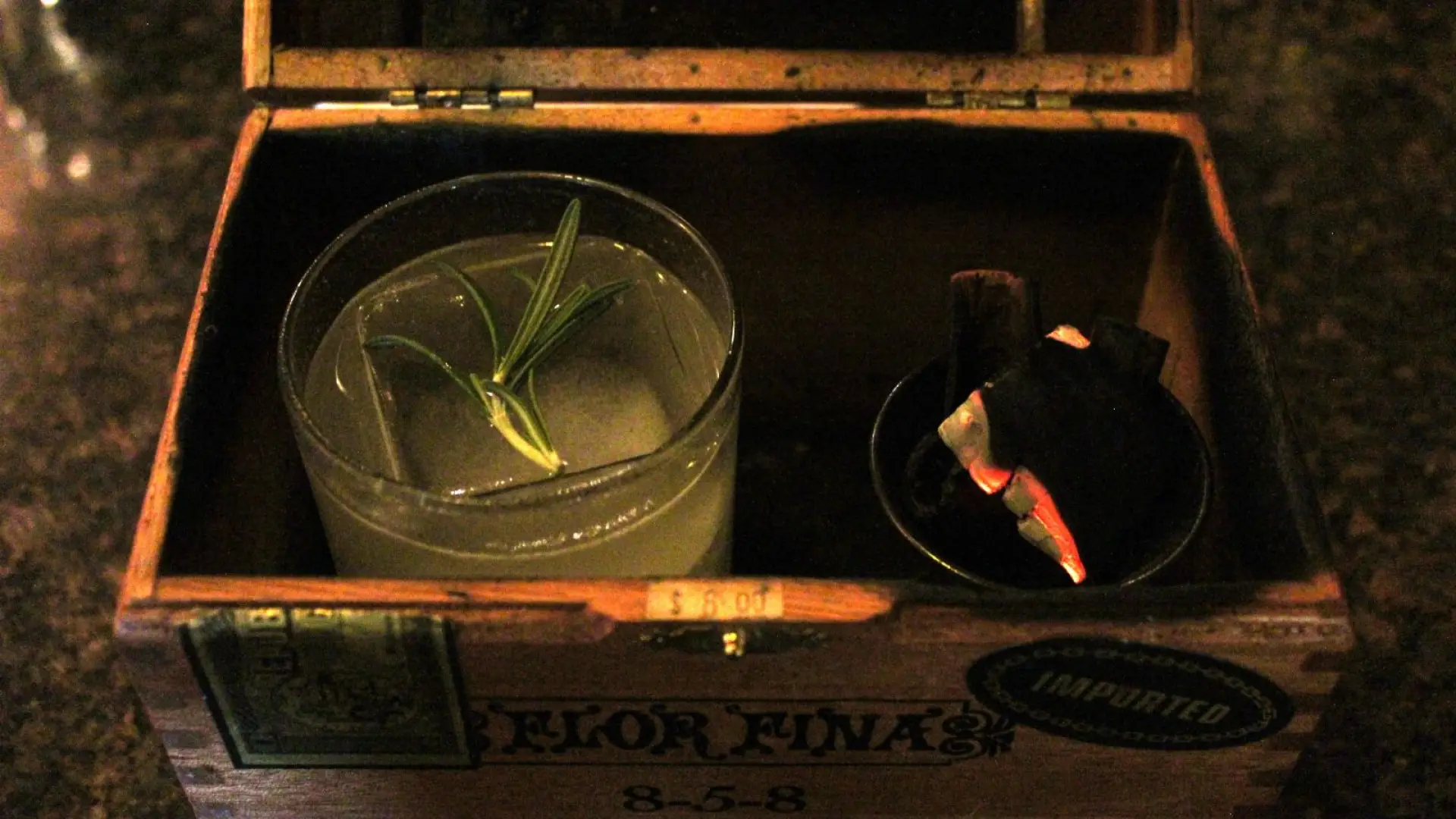 Inside the chest. Drink on the left, cinnamon ember on right.