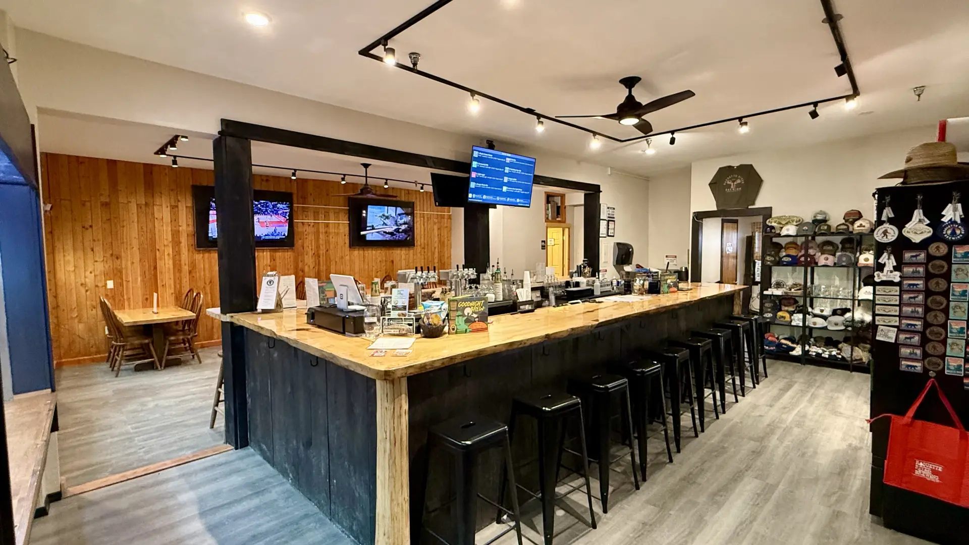 Large bar area at Raquette River Brewing Taproom.