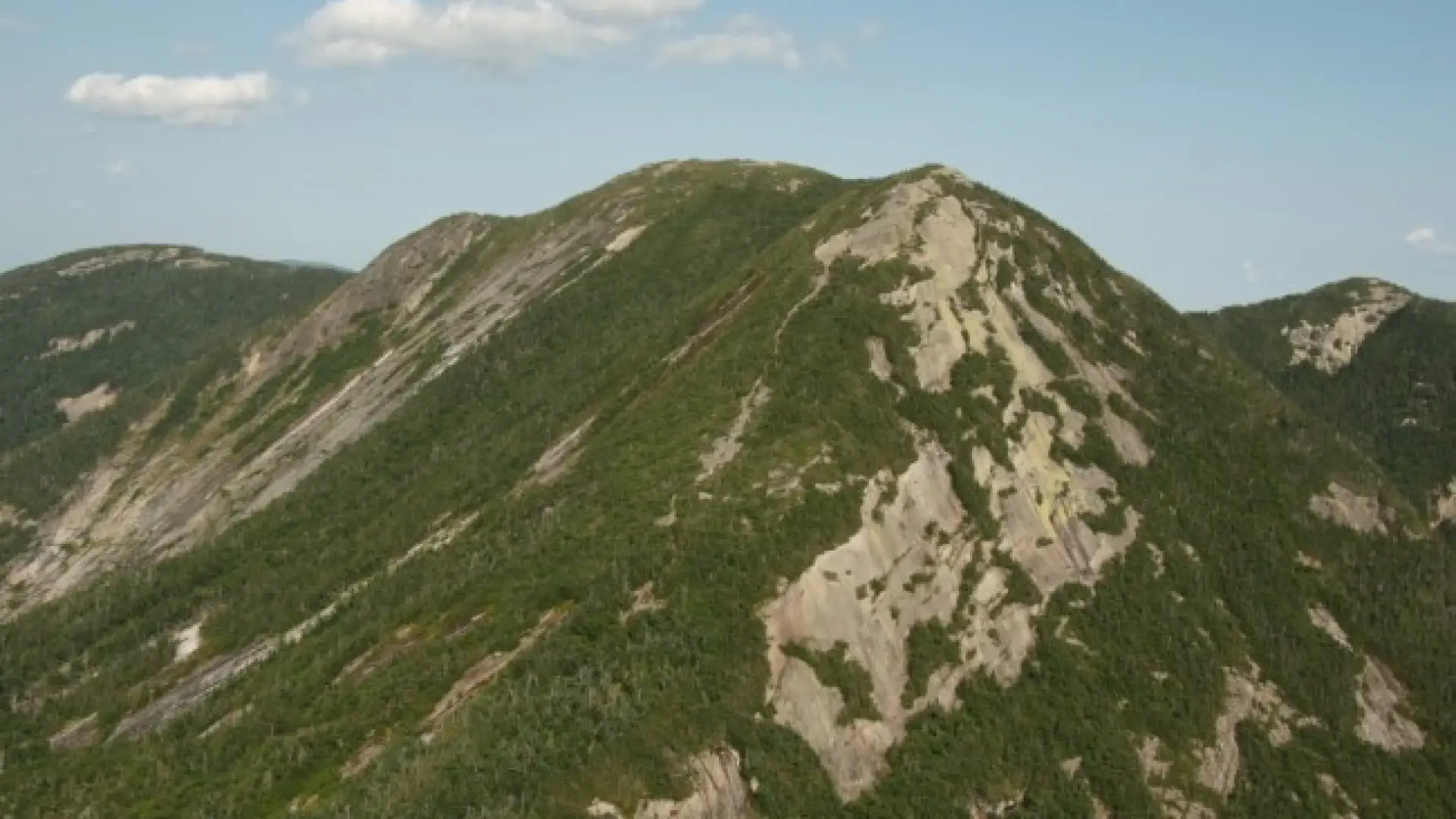 These massive slabs of rock are known as the Great Range of the Adirondacks.