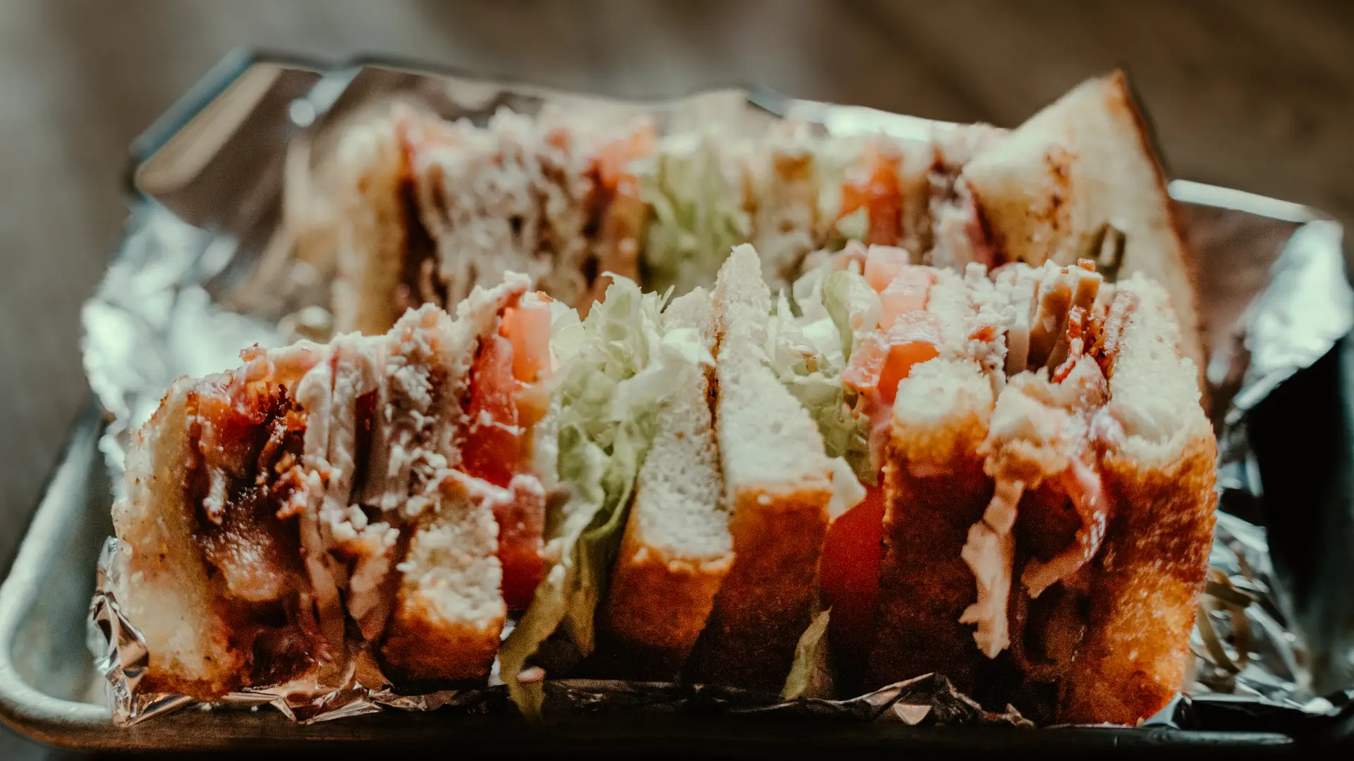 A decadent club sandwich.  Photo Credit to A. Kelly.