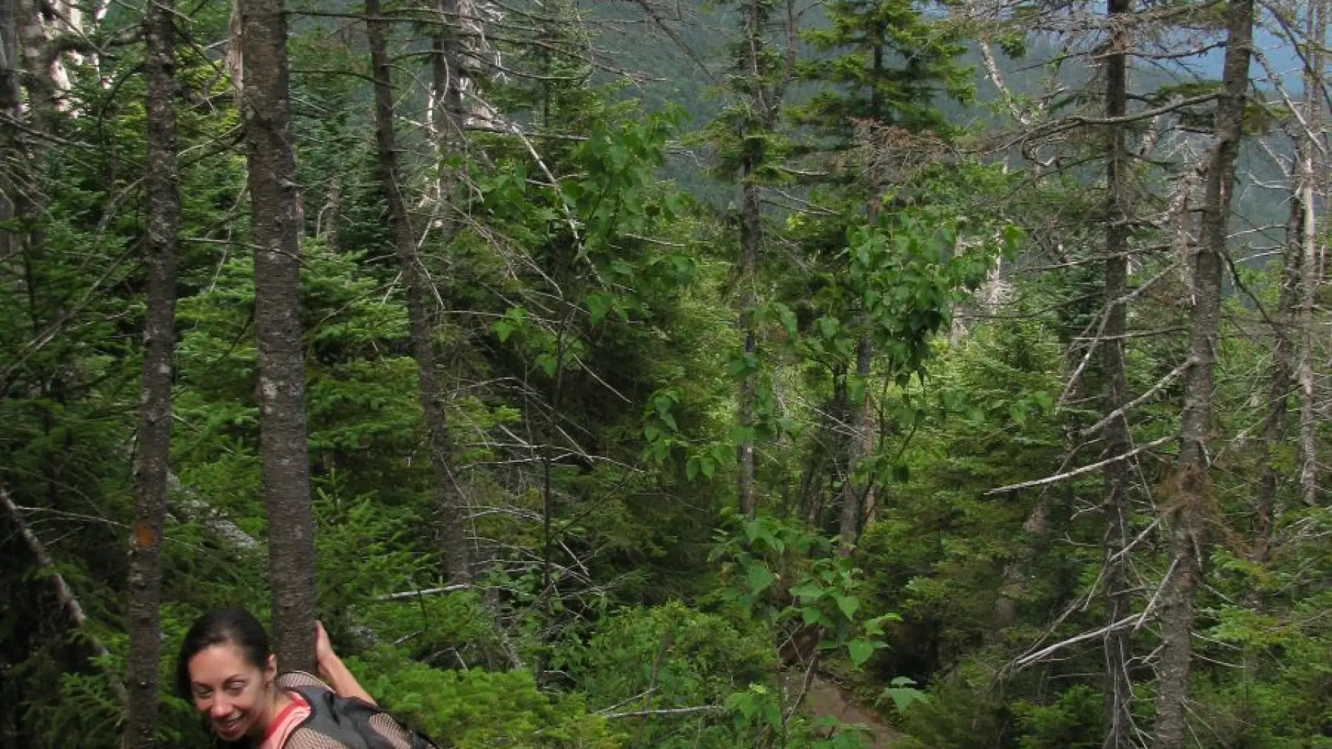 Anna hikes up the unmaintained trail to Seward's summit.