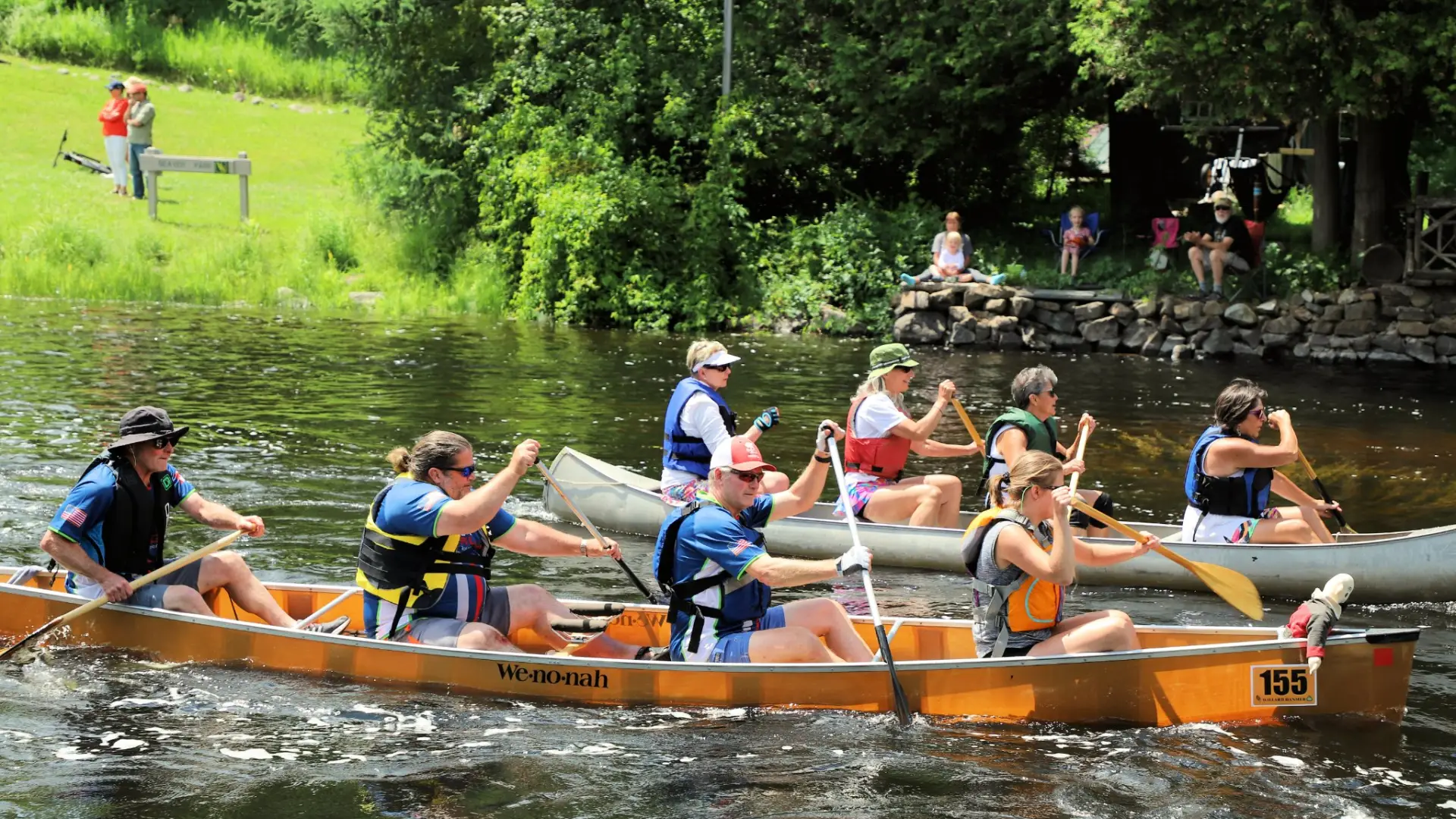 4 person boats in a neck to neck race