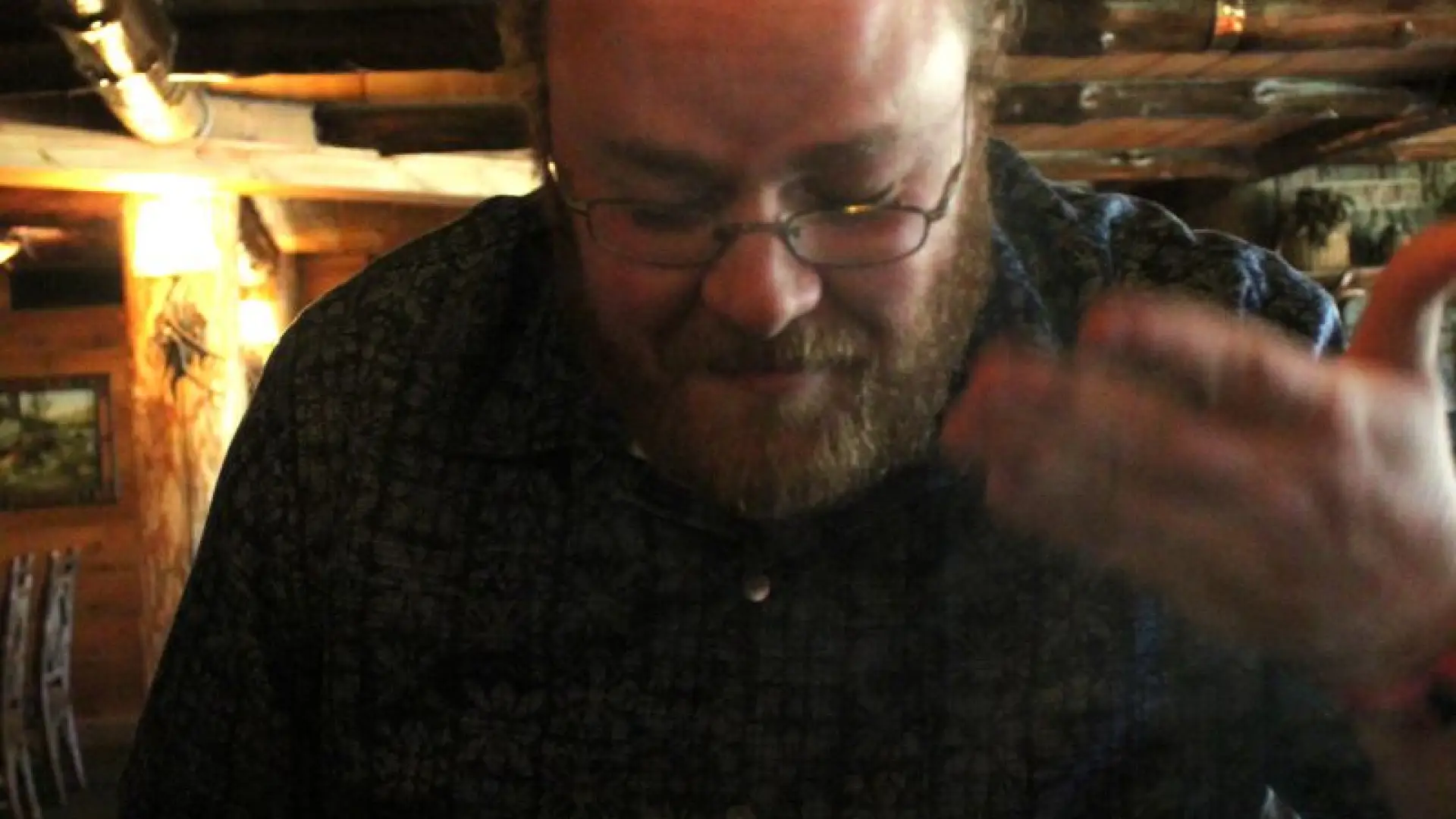 Glenn's pleasantly surprised by the cinnamon smoke wafting from the box.