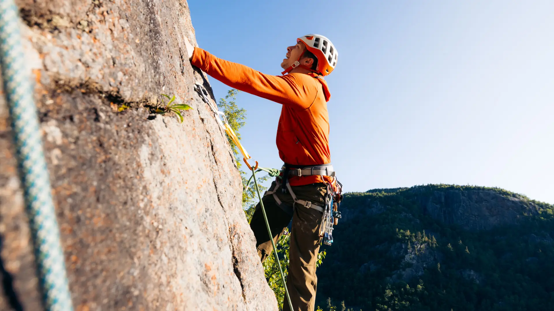 Man Rock Climbing