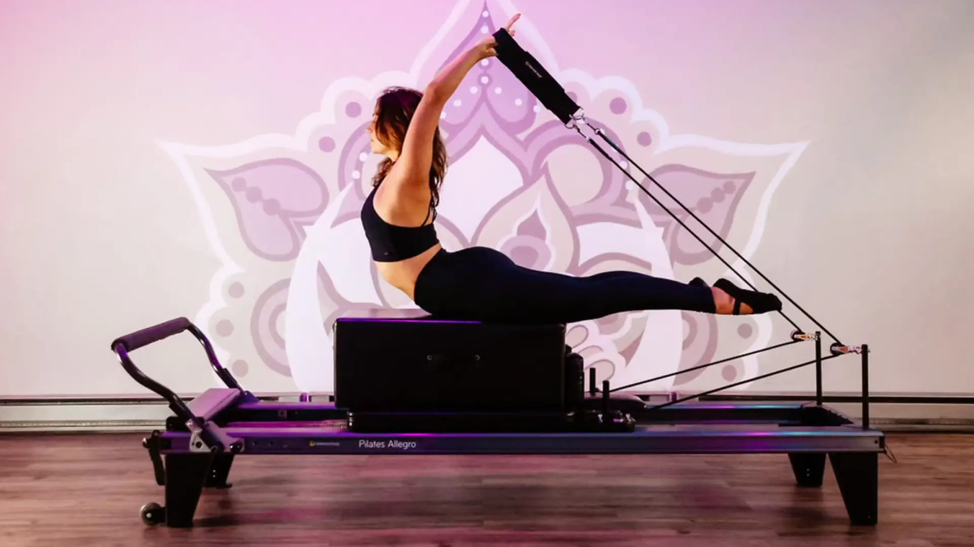 A woman uses an exercise machine