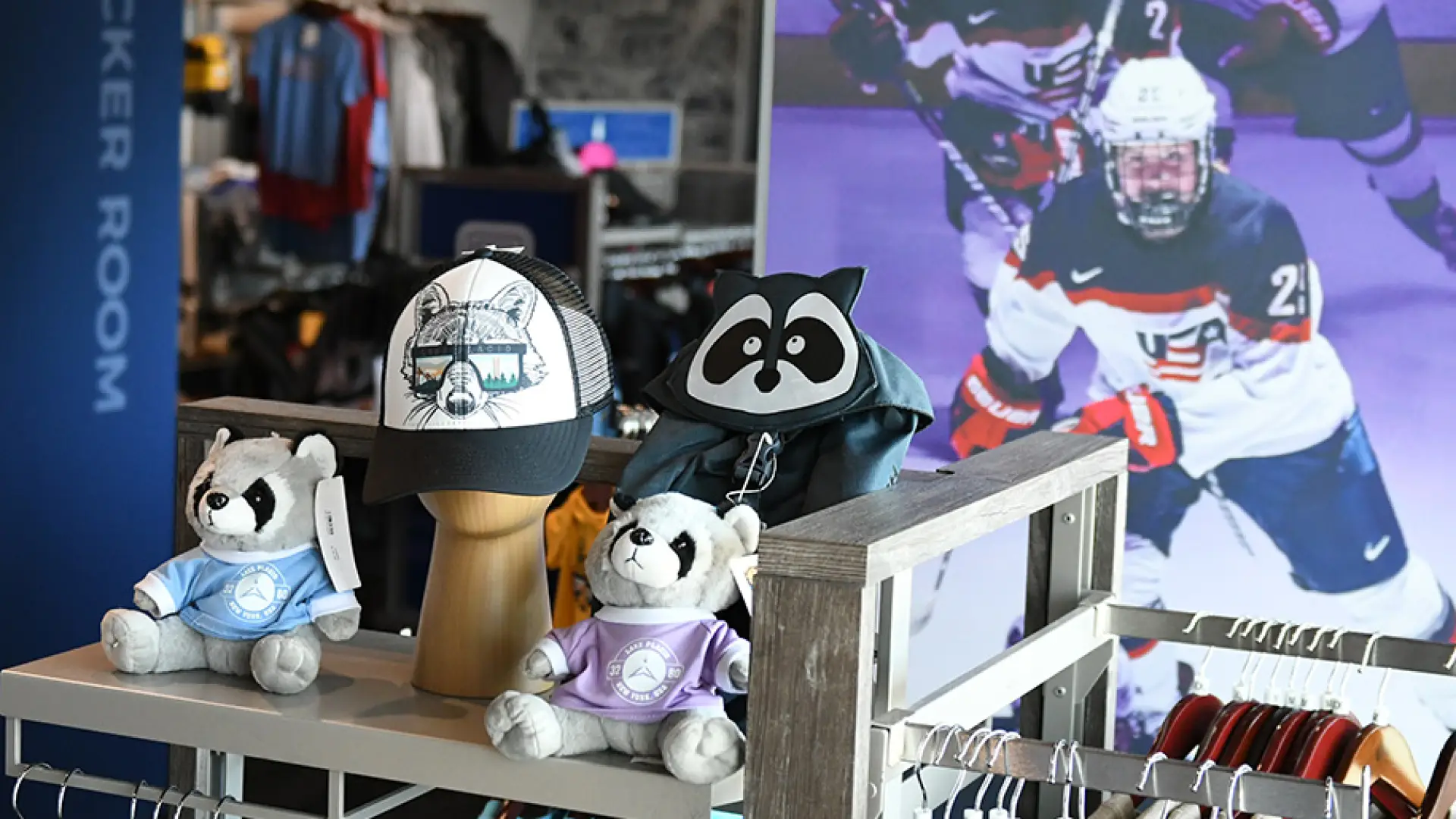 Custom hats and raccoon plushies.