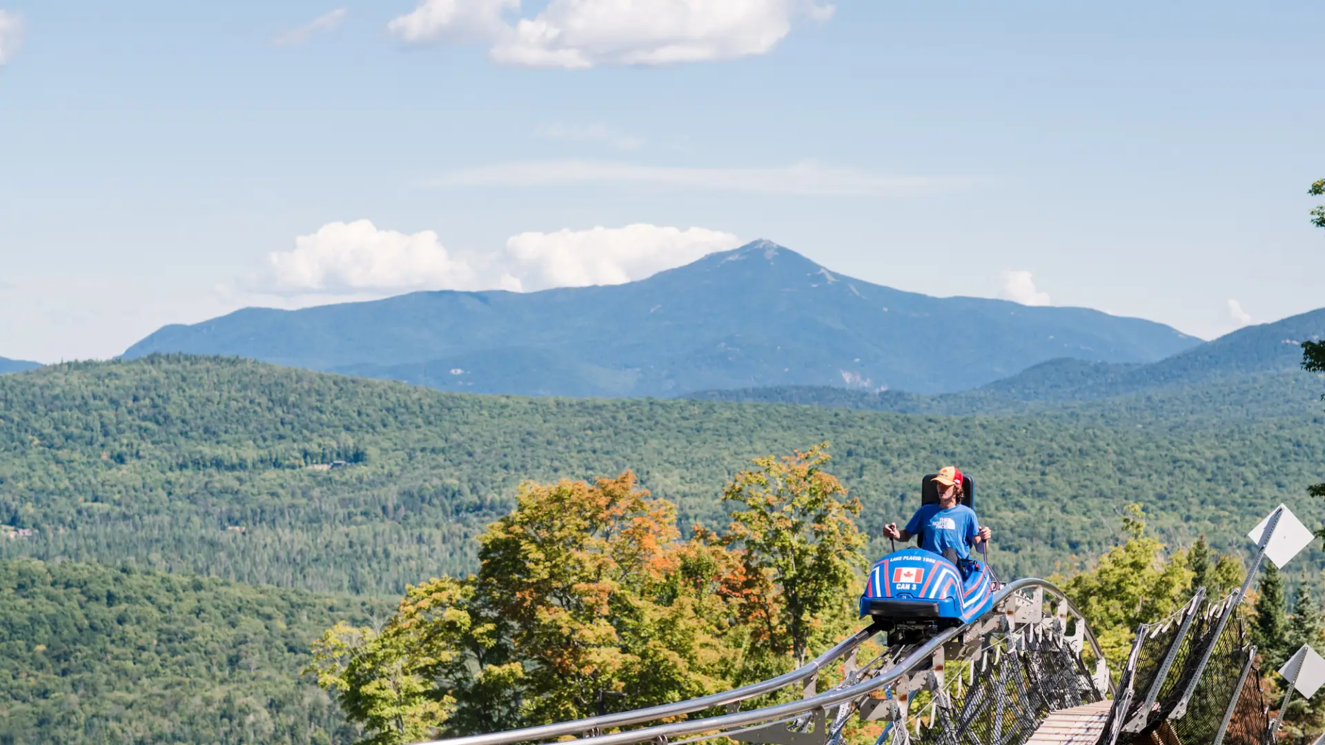 A person riding the Mountain Coaster