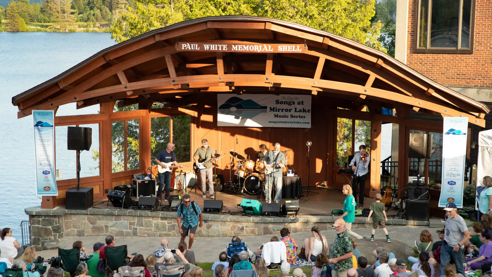 A live band performing in Mid's Park in Lake Placid