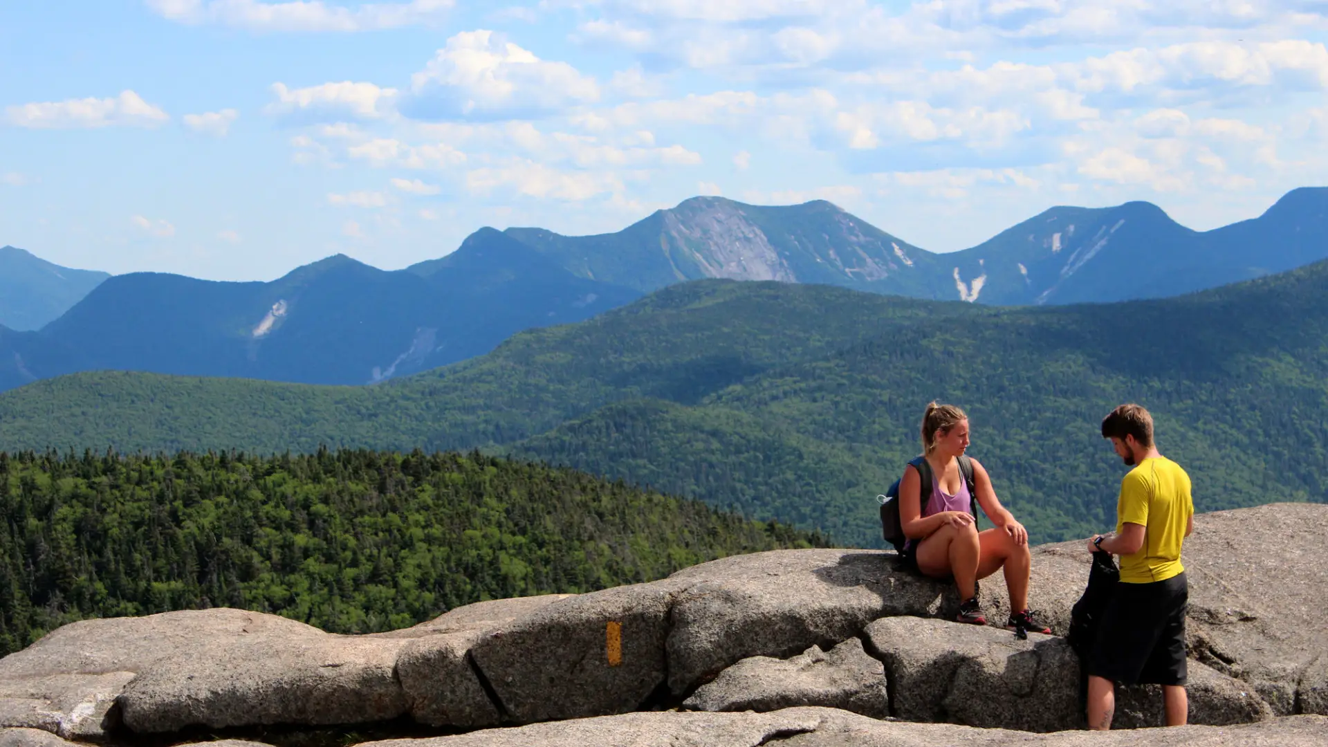 A couple people near the summit of Cascade Mountain