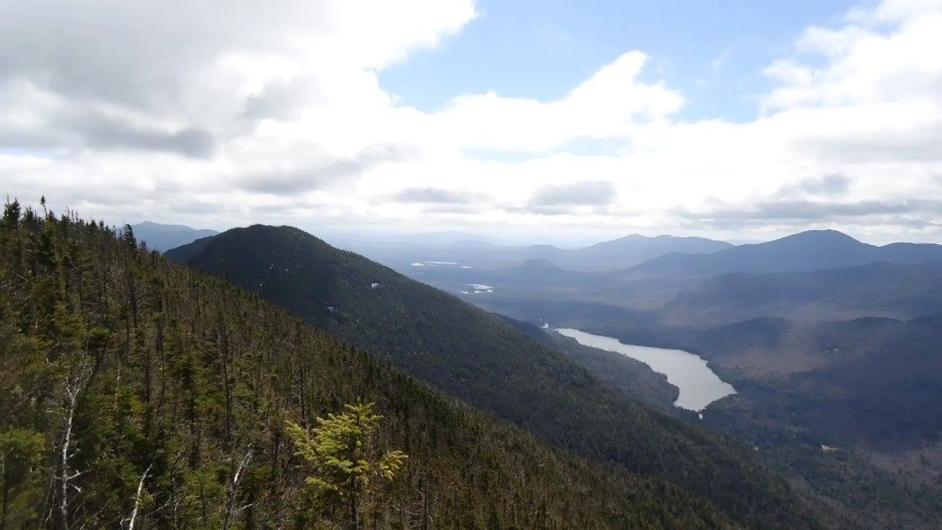 See Lower Ausable Lake from the summit of Mount Colvin.