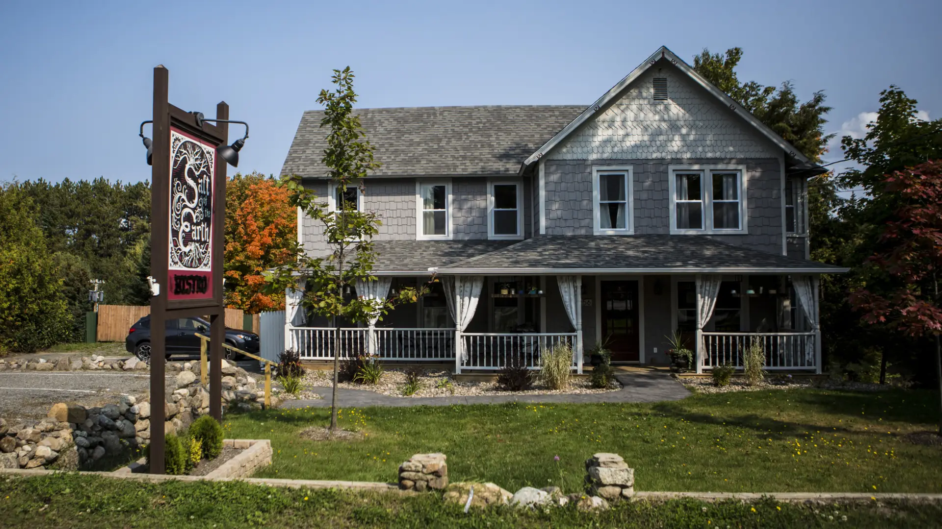 The cozy Salt of the Earth Bistro&#44; a purple-grey building with a homey feel.