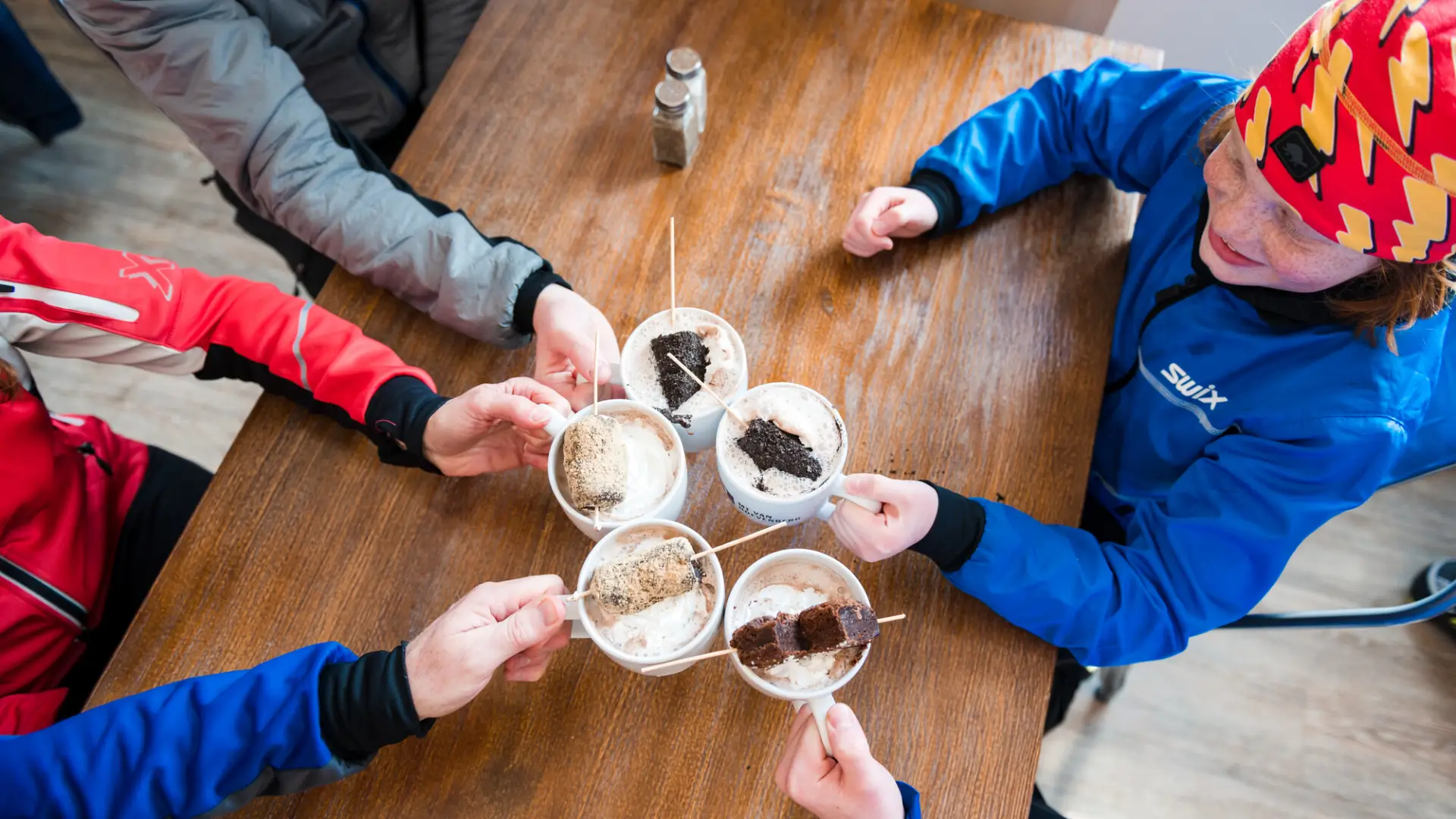Family cheers with hot cocoa