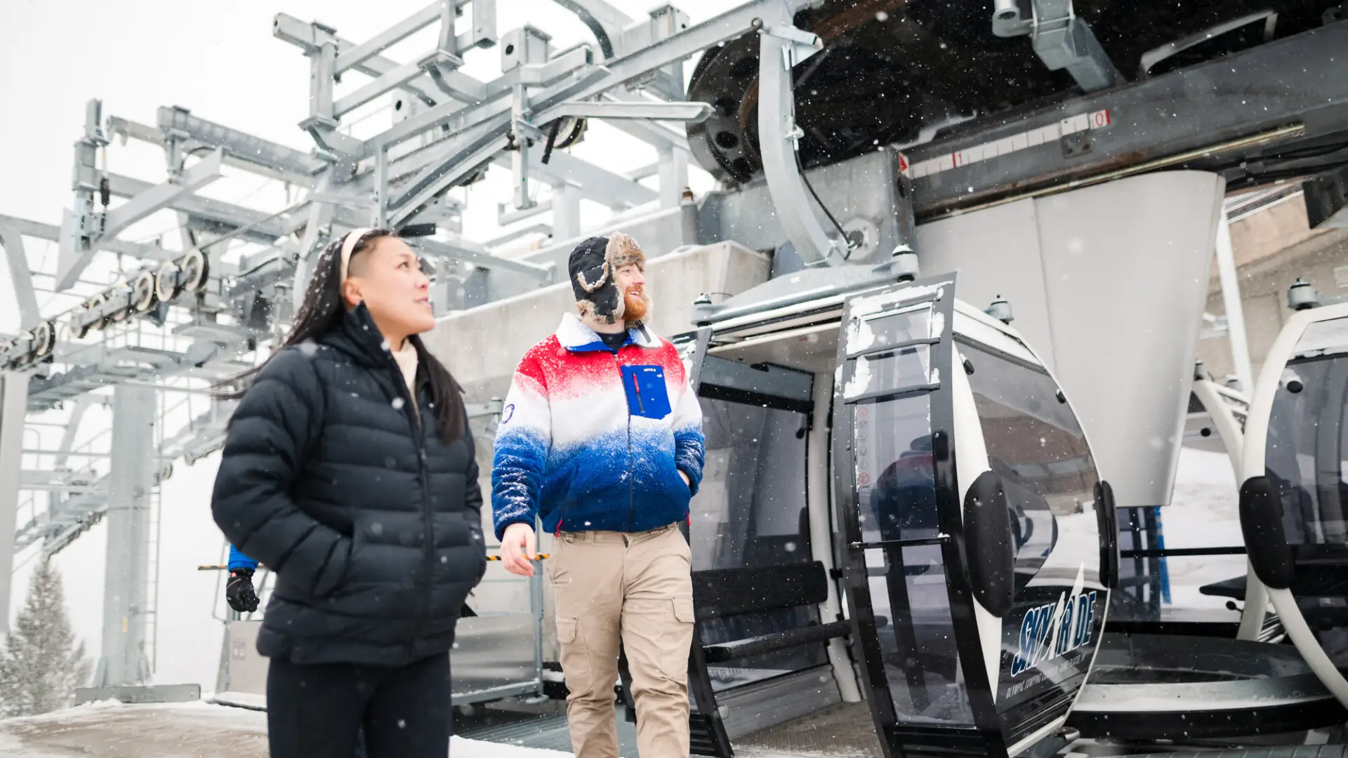 A couple prepares to go on the Skyride.