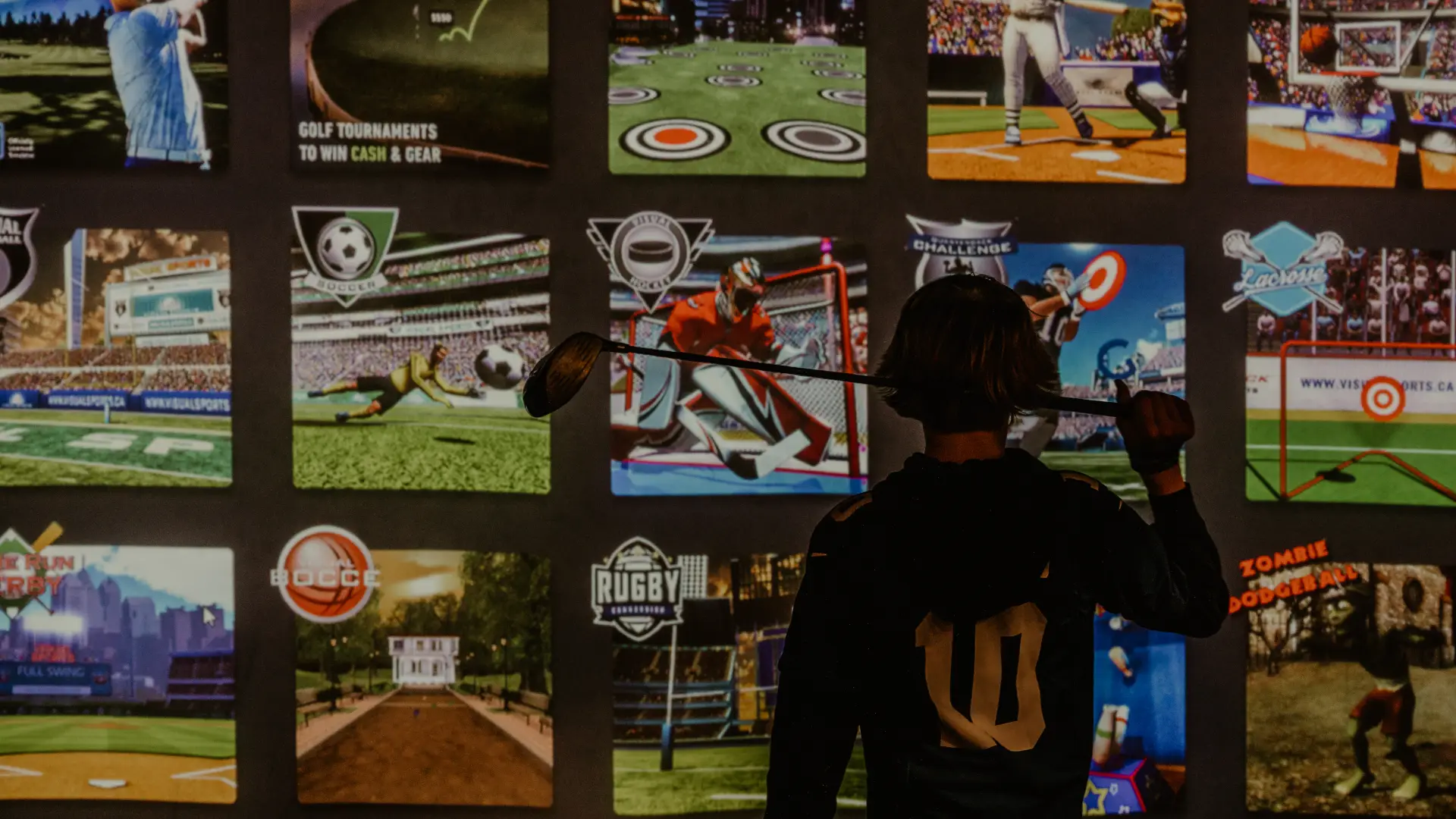 A young athlete selects his opponent in the simulator game.