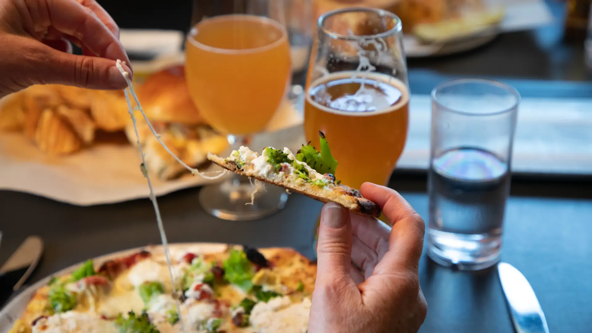 picture of a table with pub food and beers