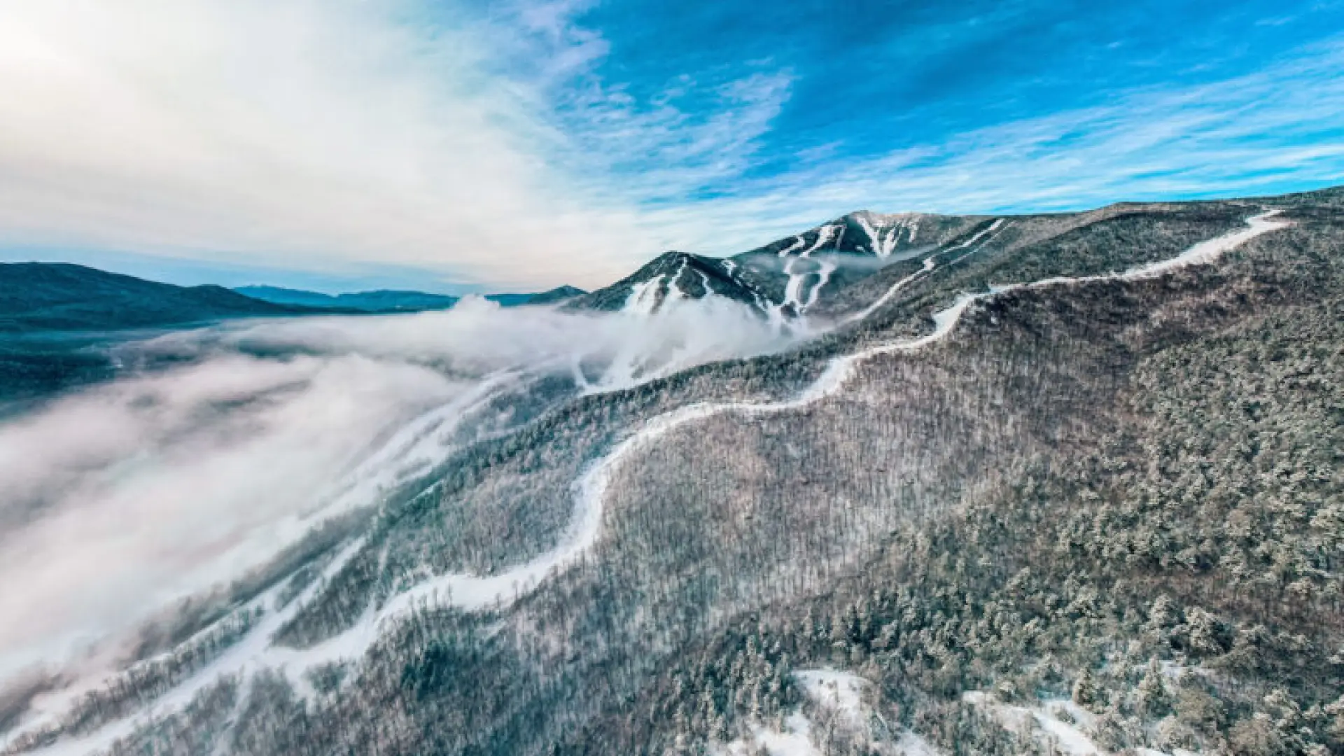 An aerial view of the ski trails on Whiteface Mountain in the winter.