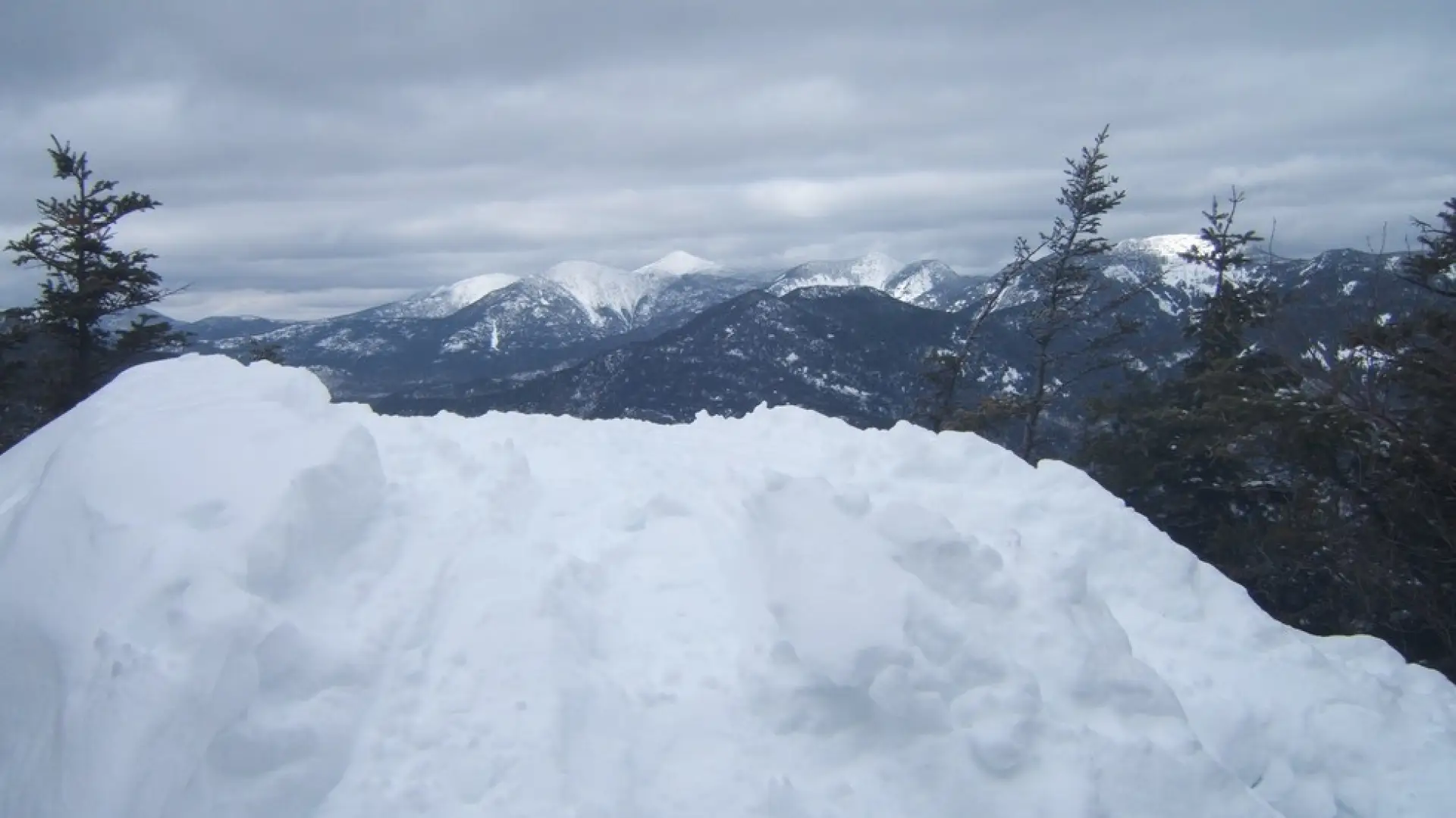 A balcony of snow at an overlook