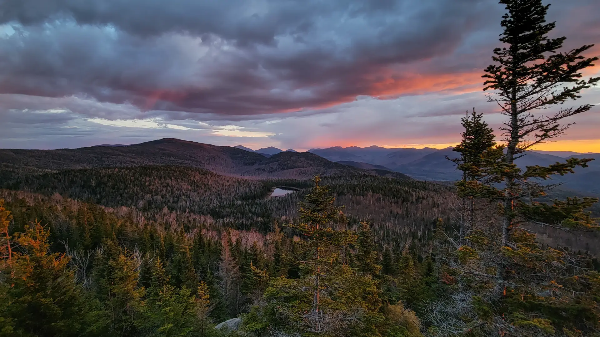 An extensive mountain view at sunset
