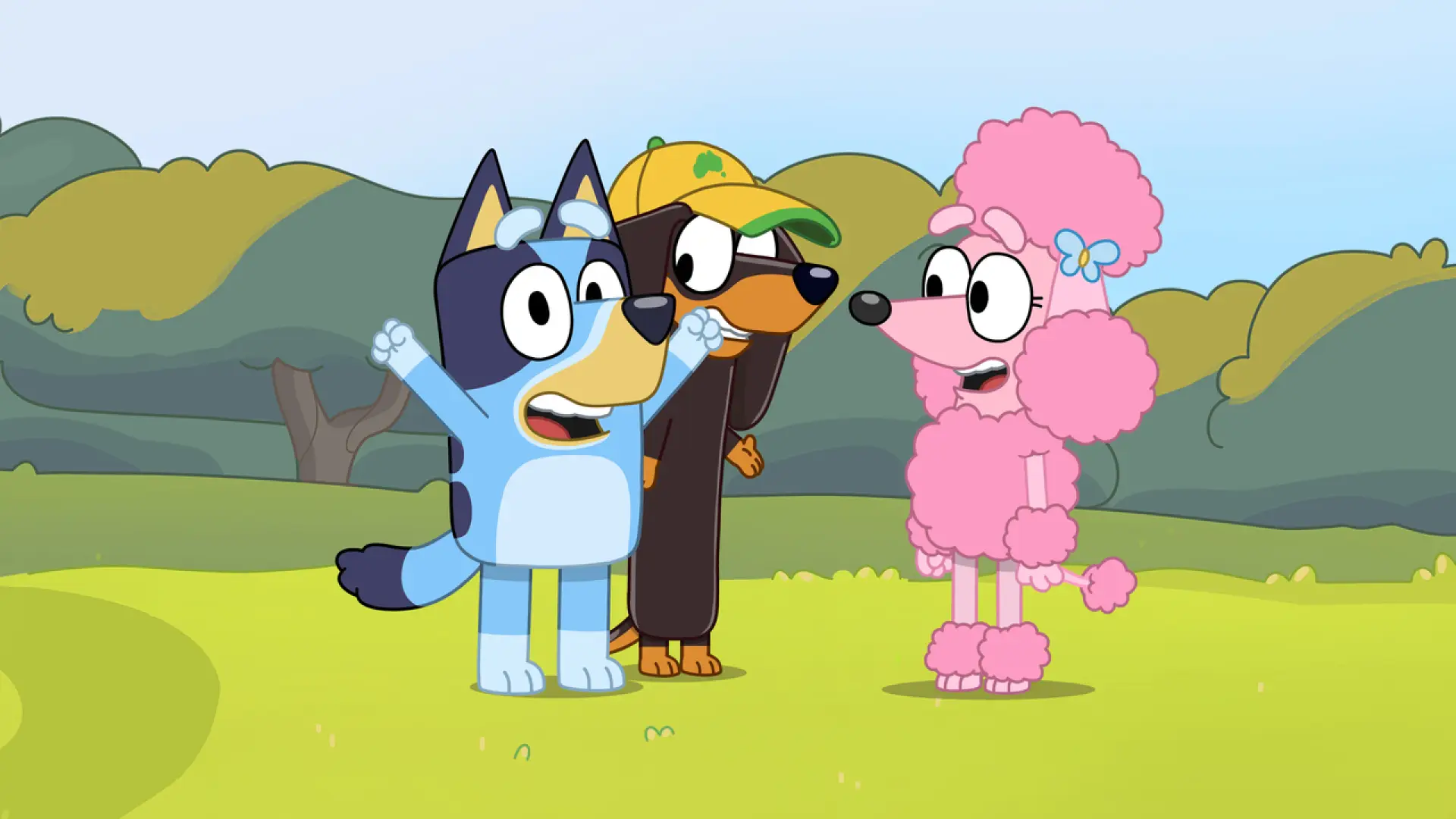 Shot from Bluey TV show featuring Bluey and two dog friends