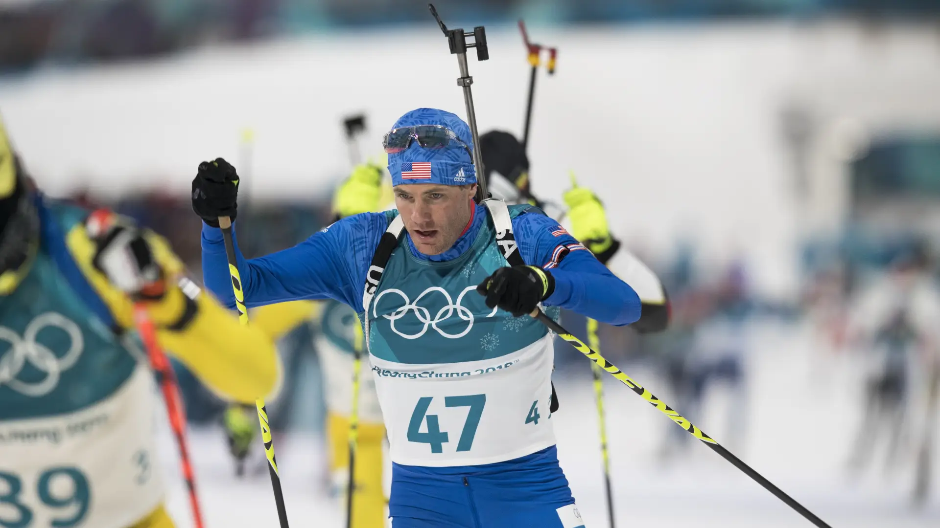 Tim Burke skis among other racers