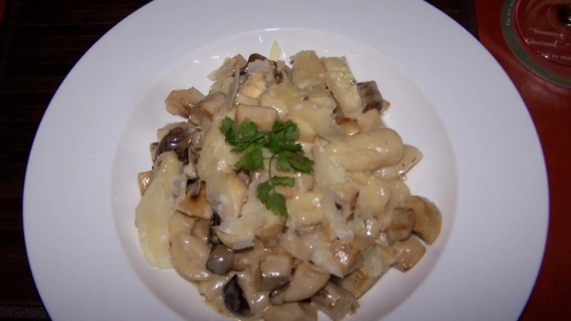 Gnocchi with garden vegetables and pesto cream sauce