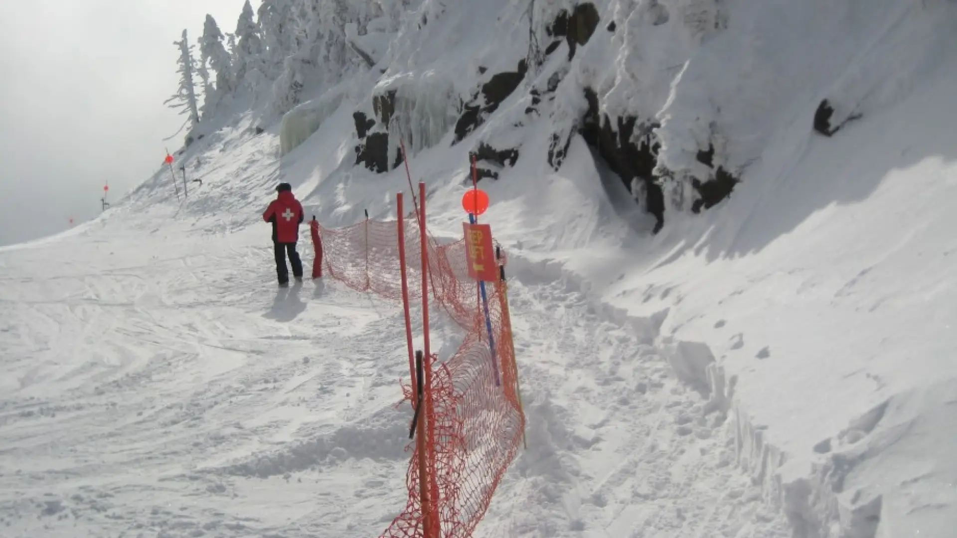 Slides open to skiers and riders with beacons and shovels