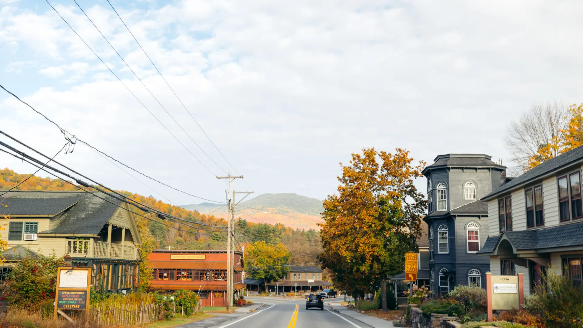 A photo of the Main Street in Keene, NY during the fall.