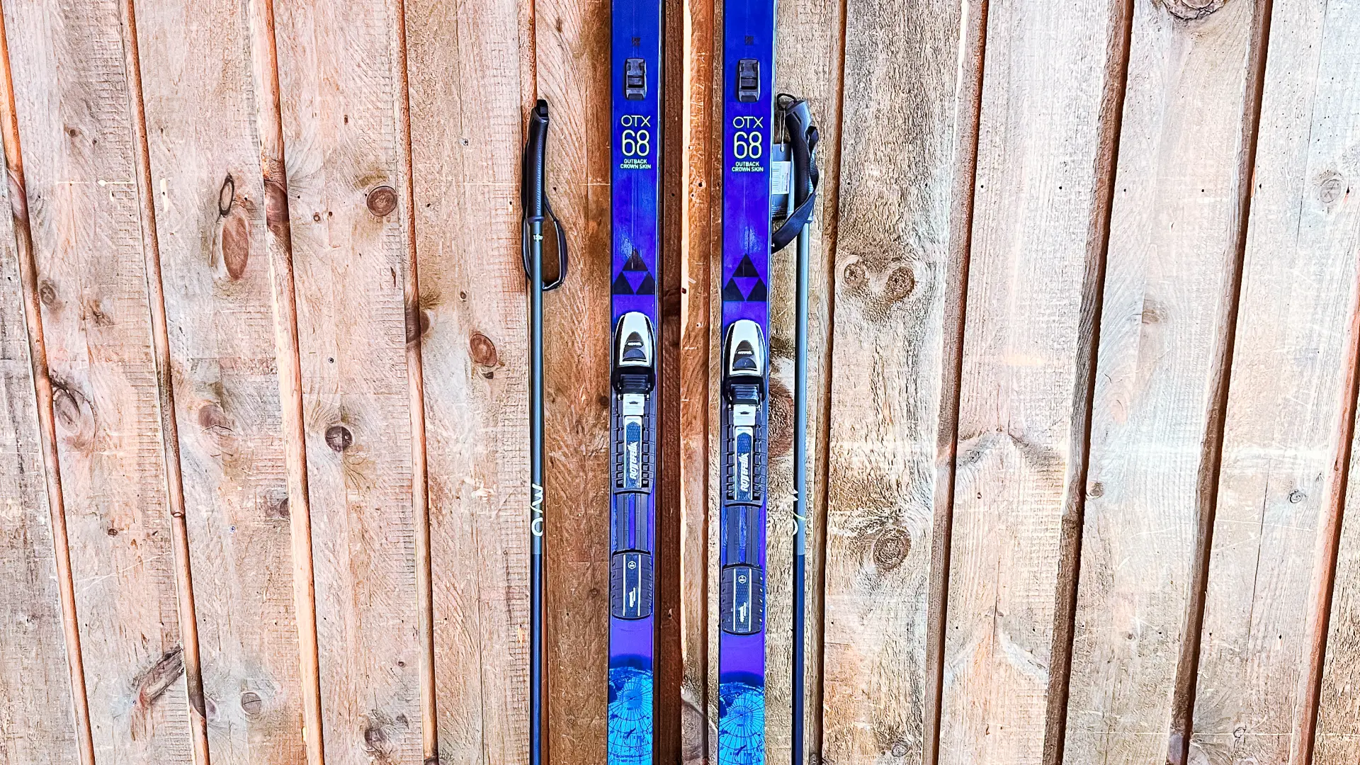 A new pair of blue skis and boots on display
