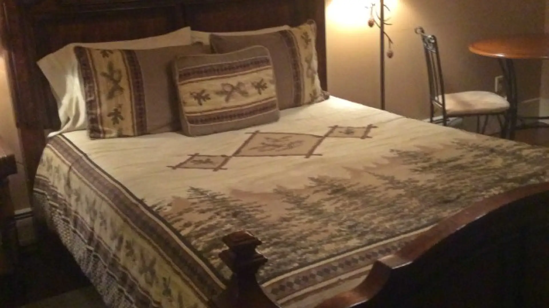 This elaborately carved bed is part of their distinctive atmosphere; old world elaboration with modern comforts.