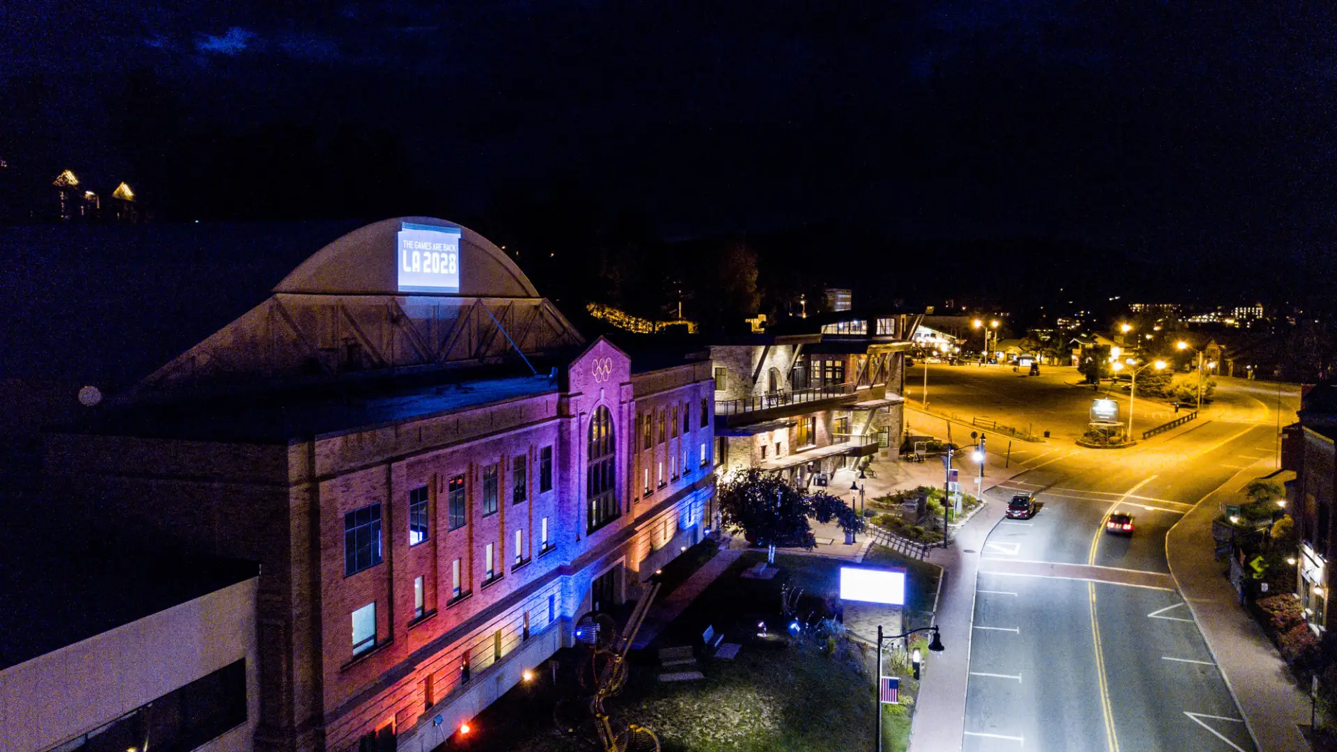 The Olympic Center on Main Street, Lake Placid at night.