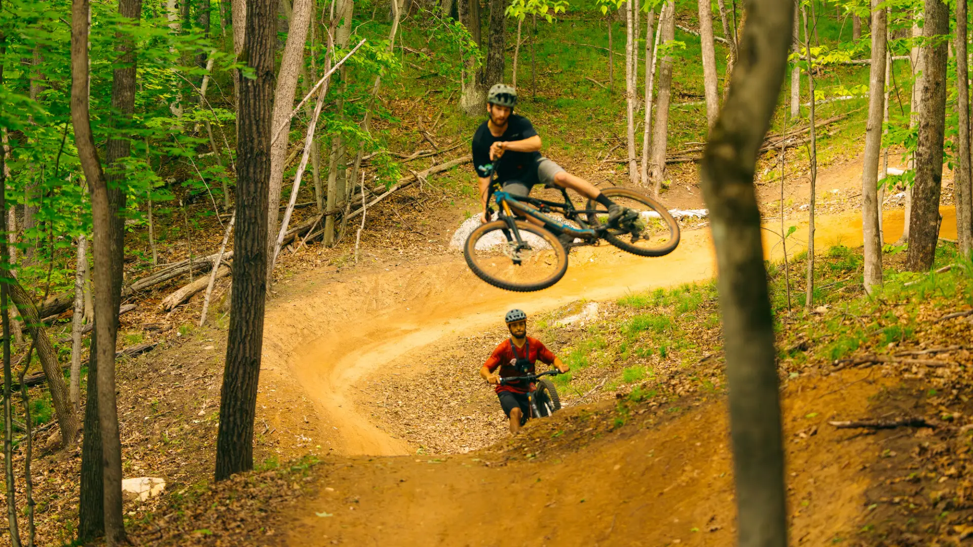 A mountain biker gets big air