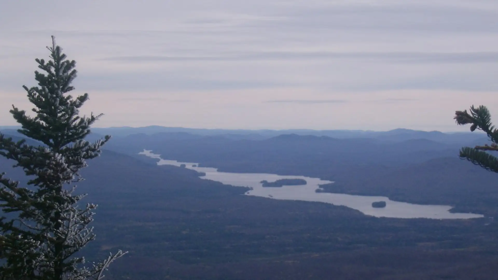 The view of a long lake from the mountains