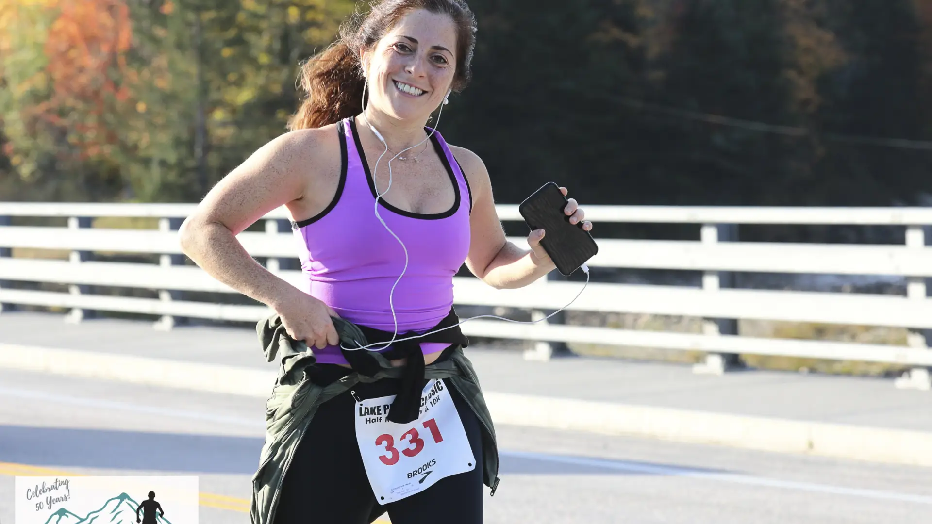 Runner smiles at the camera