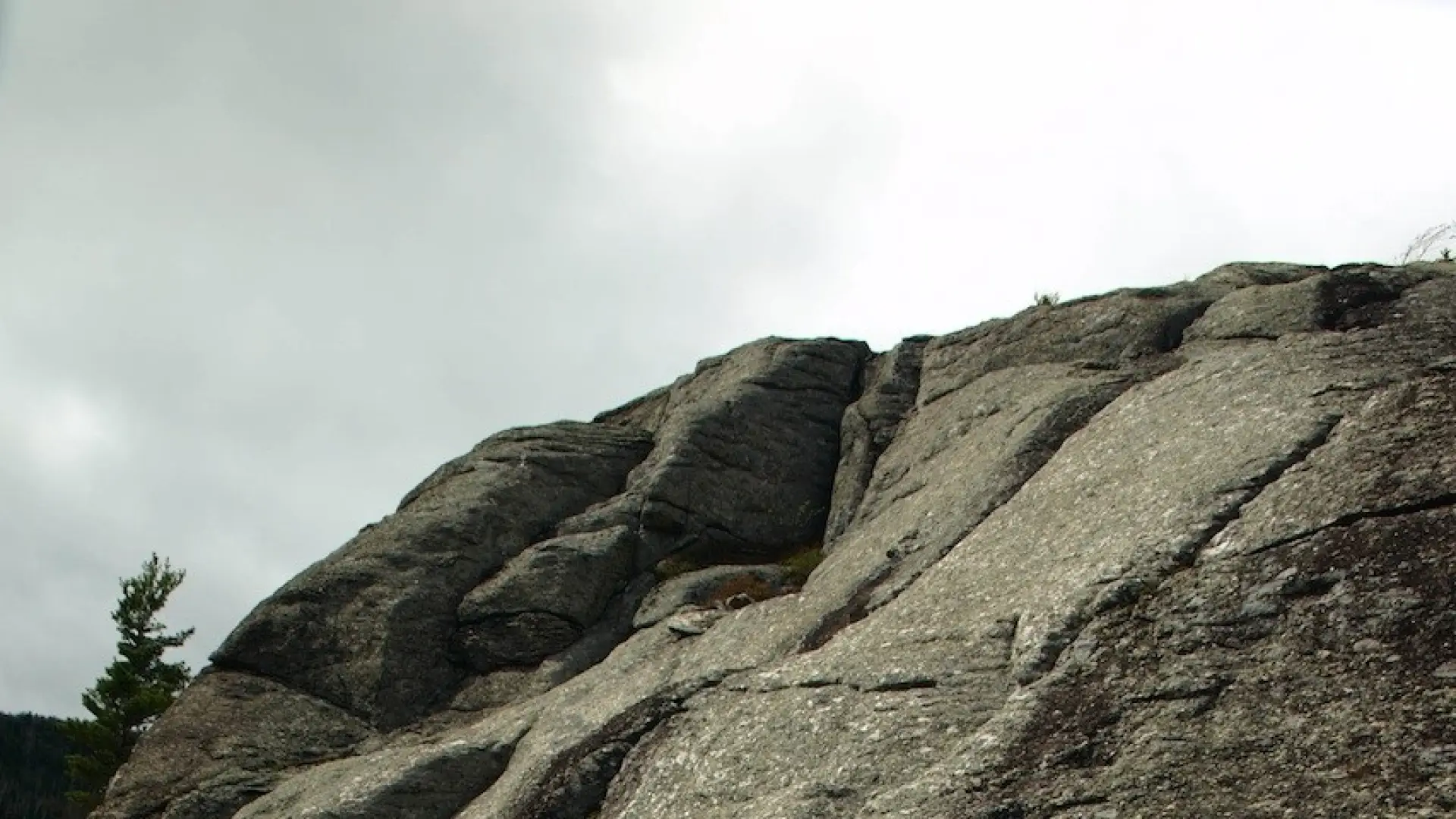 Bear Den Mountain has a rocky bluff.