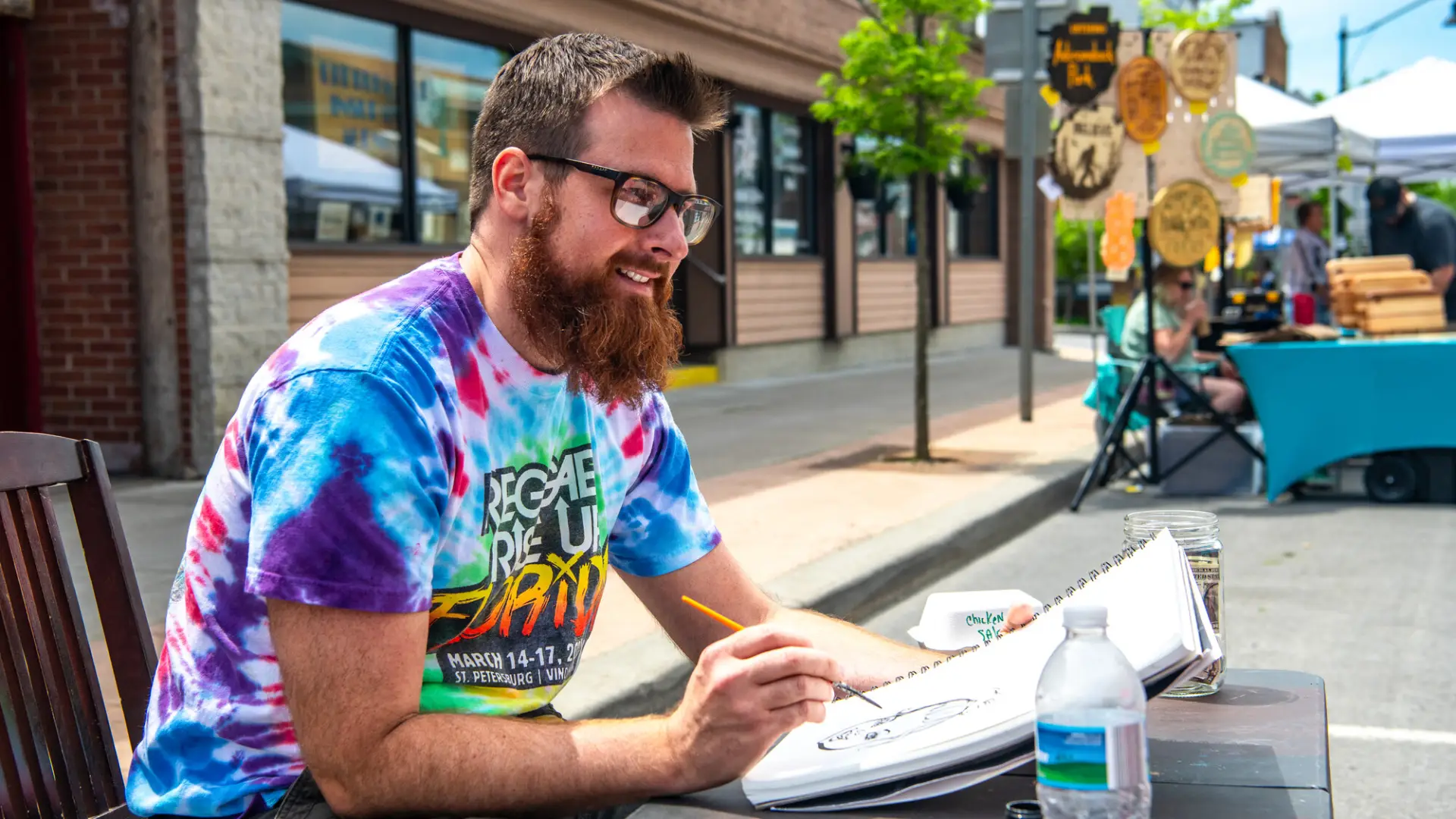 Artist on Park Street in Tupper Lake
