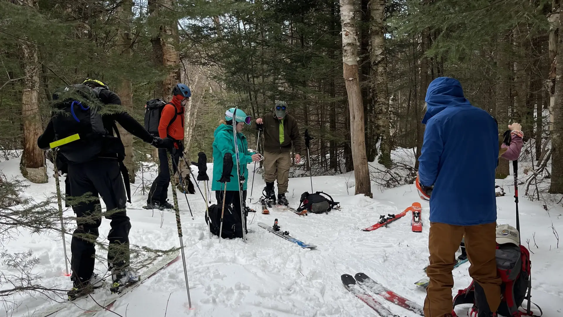 Group of back country skiiers take a break