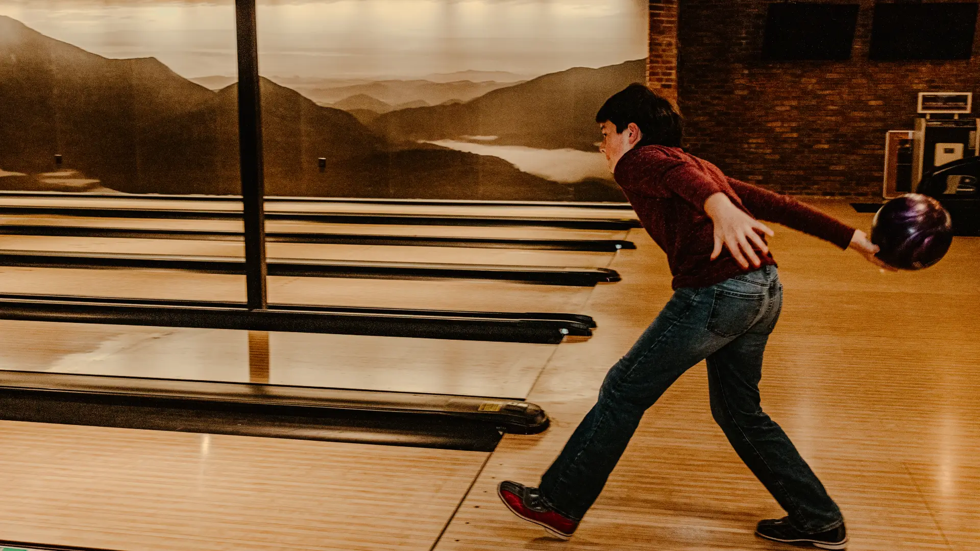 Young man bowling .  Photo Credit to A. Kelly.