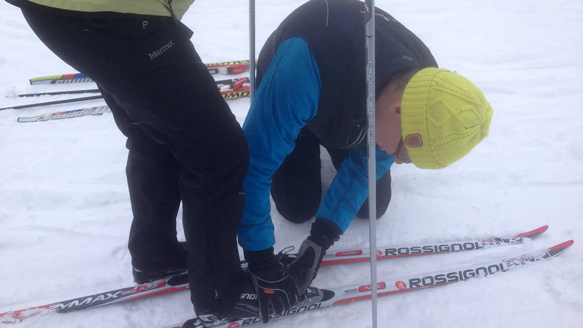 Coach-assisted clip into bindings