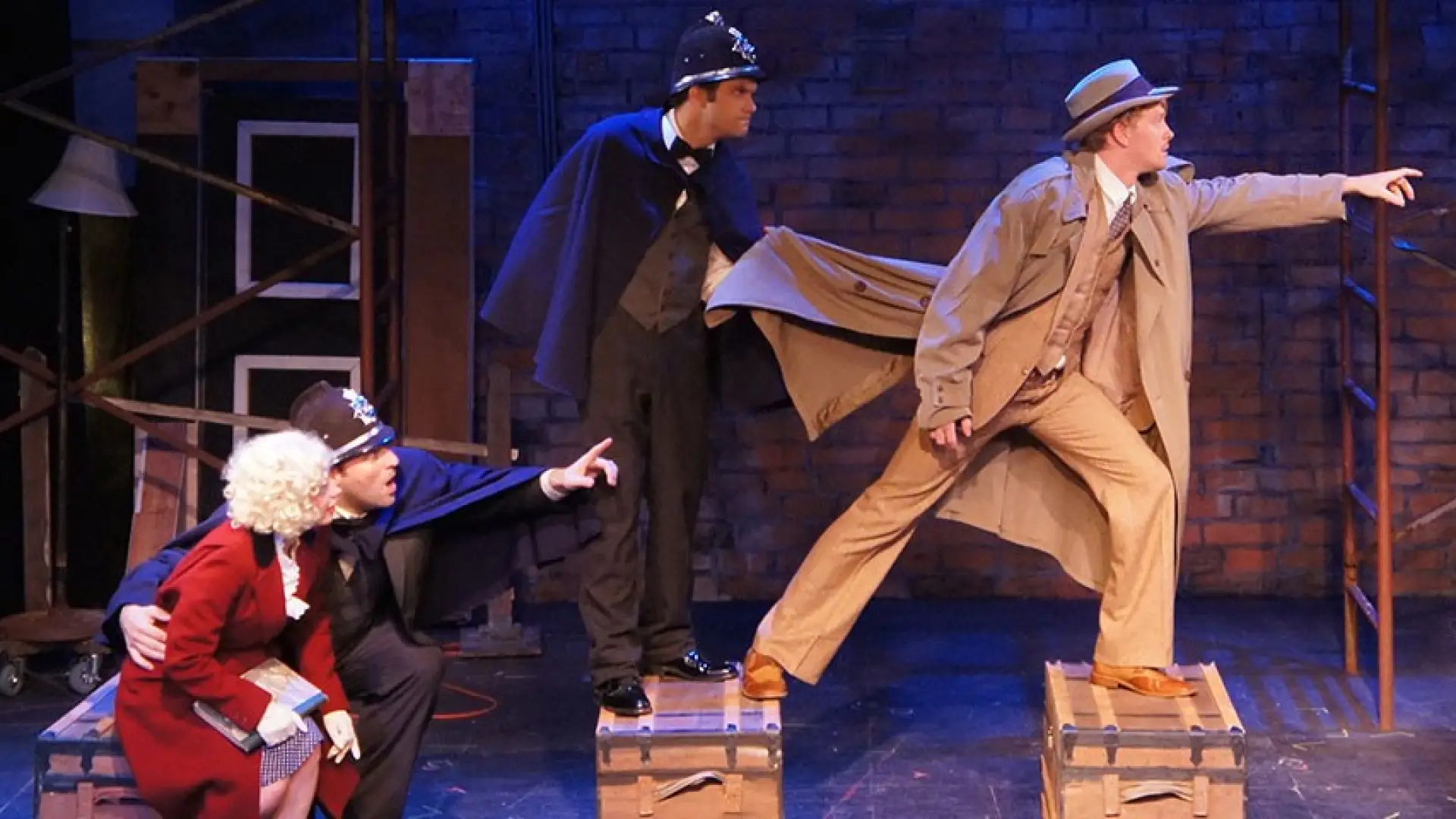People performing a play on a stage