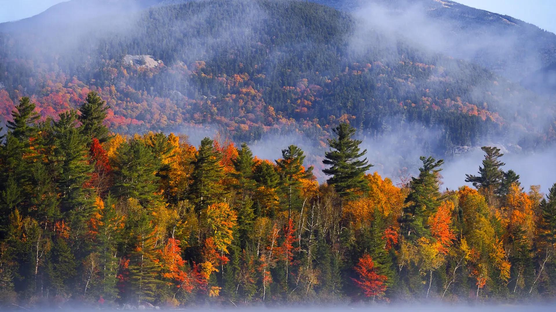 A view of Whiteface Mountain with fall scenery.