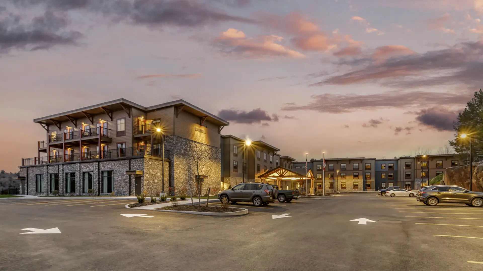 Twilight at the Cambria, showing the front entry way and ample parking on property